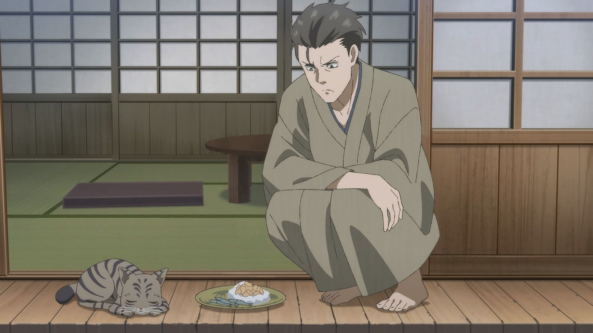Akihiko with the cat, Pomegranate (Image via 100studio)